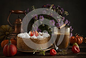 Pumpkin cheesecake with meringue on the cozy autumn background