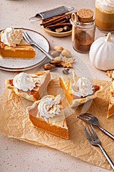 Pumpkin cheesecake swirl pie topped with whipped cream