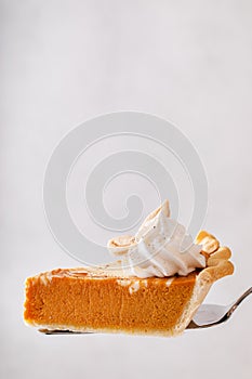 Pumpkin cheesecake swirl pie topped with whipped cream