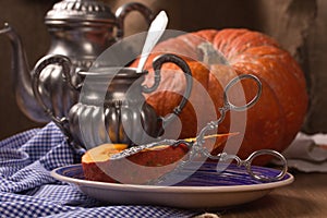 Pumpkin cooking on the kitchen table. Vintage style