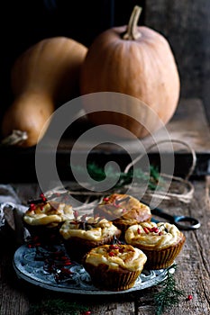 PUMPKIN CREAM CHEESE SWIRL MUFFINS.