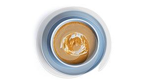 Pumpkin cream soup isolated on a white background.