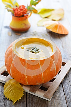 Pumpkin cream soup in pumkin