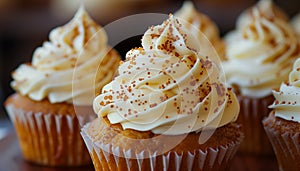 Pumpkin cupcakes with creamy frosting. AI generated.