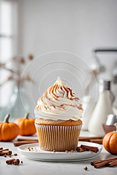 Pumpkin cupcakes with whipped cream cheese and dusted with cinnamon. Thanksgiving autumn dessert, generated AI