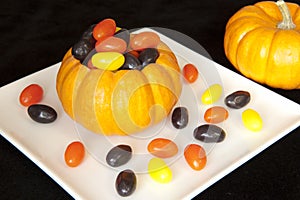 Pumpkin filled with Halloween Jellybeans photo