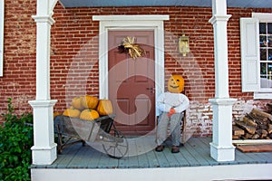 Pumpkin Man on Country Porch