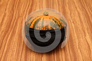 Pumpkin in a medical mask, Halloween and coronavirus