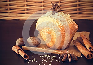 Pumpkin Oats streusel Muffins and assortment spice nutmeg, cinnamon, anise. Wooden dark brown background. Selective focus. Toned