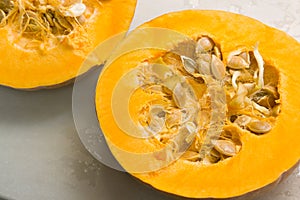 Pumpkin open in half with sprouted seeds