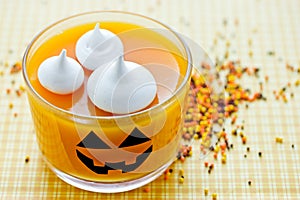 Pumpkin orange jelly or panna cotta in glass for Halloween party dessert for kids