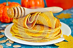 Pumpkin pancakes with honey