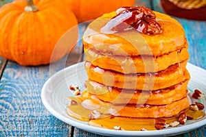 Pumpkin pancakes with honey and pecan