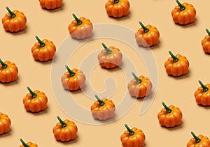 Pumpkin pattern on a beige background