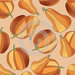 Pumpkin pattern. Vector seamless pattern on peachy background