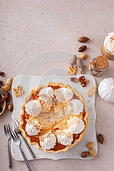 Pumpkin pie with cheesecake swirl for Thanksgiving