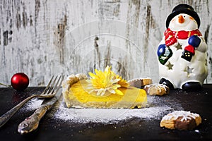 Pumpkin pie with cookies and Christmas decoration