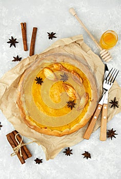 Pumpkin pie on a light table. Thanksgiving pie. Homemade baking