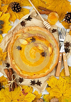 Pumpkin pie on a light table. Thanksgiving pie. Homemade baking