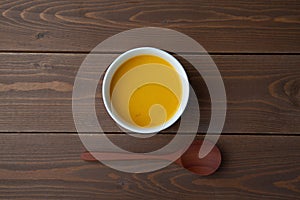 pumpkin potage soup isolated on table