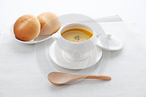 pumpkin potage soup isolated on table