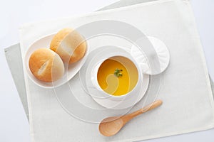 pumpkin potage soup isolated on table