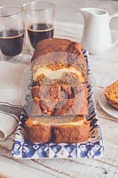 Pumpkin pound cheesecake cake with coffee