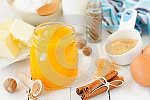 Pumpkin Puree Surrounded with Pumpkin Pie Ingredients