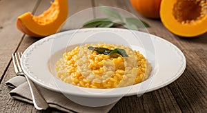 Pumpkin Risotto on Plate with Sage and Fork