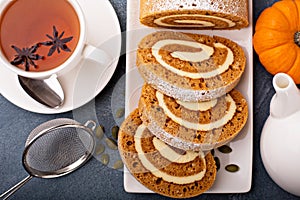 Pumpkin roll with cream cheese frosting