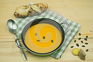 pumpkin seed soup with ginger with pumpkin seed bread