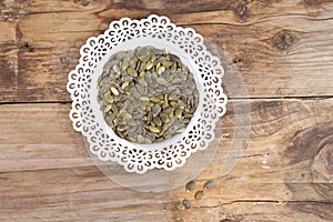 Pumpkin seed in white bowl