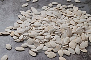 Pumpkin seeds on the cement floor