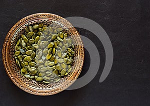 Pumpkin Seeds in a Metal Bowl