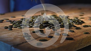 Pumpkin seeds on wood