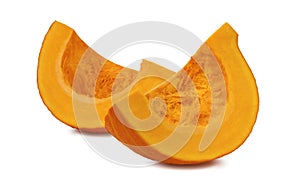 Pumpkin segment pieces isolated on white background photo