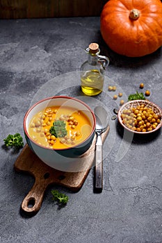 Pumpkin soup with baked chickpeas, healthy vegan eating