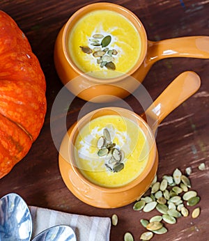 Pumpkin soup in clay pot