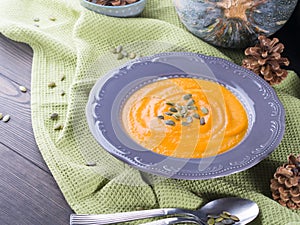 Pumpkin soup with cream and pepitas