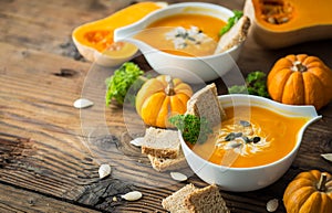 Pumpkin soup with parsley and cream