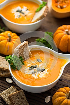 Pumpkin soup with parsley and cream