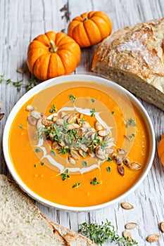 Pumpkin Soup with Sour Cream Fresh Thyme and Artisan Bread