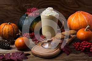 Pumpkin spice coffee latte with whipped cream