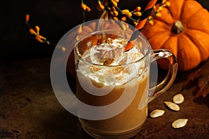 Pumpkin spice latte fall season drink with whipped cream