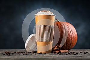 Pumpkin spice latte in a paper cup