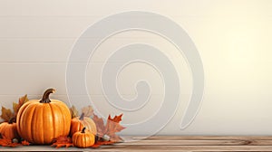 pumpkins and maple leaves on a wooden background