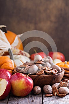 Pumpkins, nuts, indian corn and apples