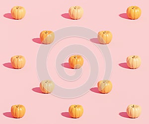 Pumpkins pattern on pink background for advertising on autumn holidays or sales, 3d render