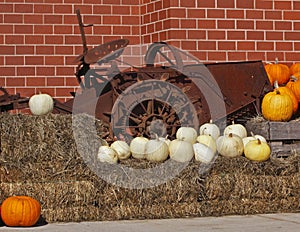 Pumpkins straw antique farm machine