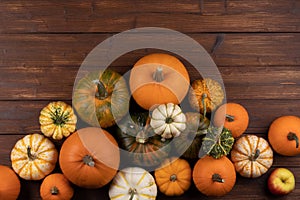 Pumpkins on wooden background